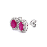 Aretes de rubíes con diamantes en oro blanco 14kt. R-0.93CTS. D-0.26CTS.