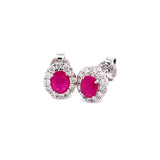 Aretes de rubíes con diamantes en oro blanco 14kt. R-0.72CTS. D-0.33CTS.
