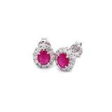 Aretes de rubíes con diamantes en oro blanco 14kt. R-0.65CTS. D-0.37CTS.