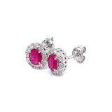 Aretes de rubíes con diamantes en oro blanco 14kt. R-0.65CTS. D-0.37CTS.