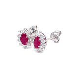 Aretes de rubíes con diamantes en oro blanco 14kt. R-0.55CTS. D-0.38CTS.