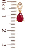 Aretes con rubí y diamantes en oro amarillo 14KT