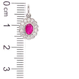 Dije de rubí con diamantes en oro blanco 14kt. R-0.28CTS. D-0.18CTS.