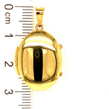 Relicario (ovalado) en oro amarillo 18kt.