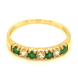 Anillo de esmeraldas y topacio blanco en oro amarillo 10kt. EM-0.20CTS. TB-0.15CTS.