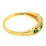 Anillo de esmeraldas y topacio blanco en oro amarillo 10kt. EM-0.20CTS. TB-0.15CTS.