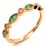 Anillo de esmeraldas con diamantes en oro rosado 14kt. EM-0.60CTS. D-0.04CTS.