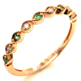 Anillo de esmeraldas con diamantes en oro rosado 14kt. EM-0.08CTS. D-0.06CTS.
