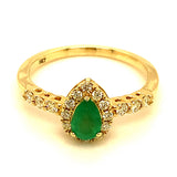 Anillo de esmeralda y diamantes en oro amarillo 14kt. EM-0.39CTS. D-0.26CTS.