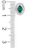 Aretes de esmeraldas con diamantes en oro blanco 14kt. EM-0.33CTS. D-0.05CTS.