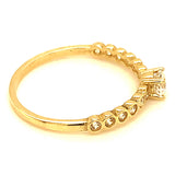 Anillo con circones en oro amarillo 10kt.