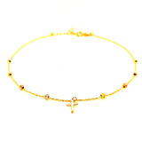 Tobillera (bolitas con dije de cruz) en oro tres tonos 10kt. 23/25cm