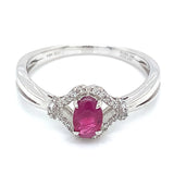 Anillo con rubí y diamantes en oro blanco 14KT