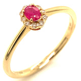 Anillo de rubí con diamantes en oro amarillo 14kt. R-0.20CTS. D-0.05CTS.