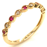 Anillo con rubí y diamantes en oro amarillo 14KT