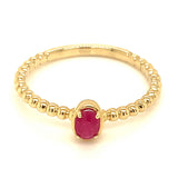 Anillo de rubí en oro amarillo 14kt. R-0.25CTS.