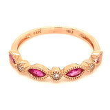Anillo de rubíes con diamantes en oro rosado 14kt. R-0.60CTS. D-0.04CTS.
