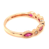 Anillo de rubíes con diamantes en oro rosado 14kt. R-0.60CTS. D-0.04CTS.