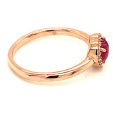 Anillo con rubí (Cabouchon) y diamantes en oro rosado 10KT