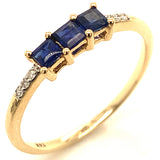 Anillo con zafiro y diamantes en oro amarillo 14KT