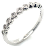 (SOFIA) Anillo con diamantes en oro blanco 10kt. D-0.10CTS.