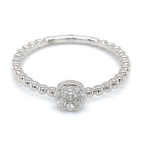 (SOFIA) Anillo con diamantes en oro blanco 10kt. D-0.12CTS.