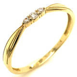 Anillo con circones en oro amarillo 10kt.