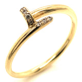 Anillo (clavo) con circones en oro amarillo 10kt.