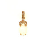 Dije de ópalo con diamantes en oro amarillo 14kt. OP-0.80CTS. D-0.07CTS.