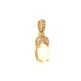 Dije de ópalo con diamantes en oro amarillo 14kt. OP-0.80CTS. D-0.07CTS.