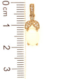 Dije de ópalo con diamantes en oro amarillo 14kt. OP-0.80CTS. D-0.07CTS.