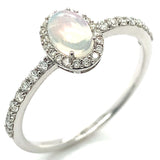 Anillo con ópalo y diamantes en oro blanco 10kt