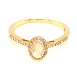 Anillo con ópalo y diamantes en oro amarillo 14kt