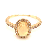 Anillo con ópalo y diamantes en oro amarillo 14kt
