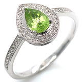 Anillo con peridoto y diamantes en oro blanco 14kt