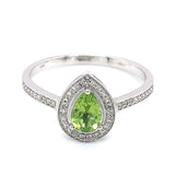 Anillo con peridoto y diamantes en oro blanco 14kt