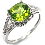 Anillo con peridoto y diamantes en oro blanco 14kt