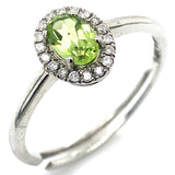 Anillo con peridoto y diamantes en oro blanco 14kt