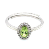 Anillo con peridoto y diamantes en oro blanco 14kt