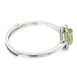 Anillo con peridoto y diamantes en oro blanco 14kt