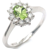 Anillo con peridoto y diamantes en oro blanco 10kt