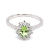 Anillo con peridoto y diamantes en oro blanco 10kt
