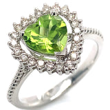 Anillo con peridoto y diamantes en oro blanco 10kt