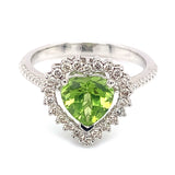 Anillo con peridoto y diamantes en oro blanco 10kt
