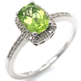 Anillo con peridoto y diamantes en oro blanco 14kt