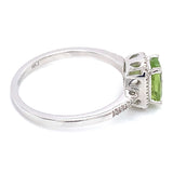 Anillo con peridoto y diamantes en oro blanco 14kt