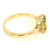 Anillo con peridoto y diamantes en oro amarillo 10kt