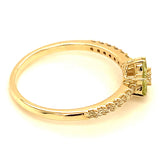 Anillo con peridoto y diamantes en oro amarillo 10kt