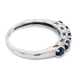 Anillo con zafiro y diamantes en oro blanco 10KT