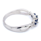 Anillo con zafiro y diamantes en oro blanco 10KT